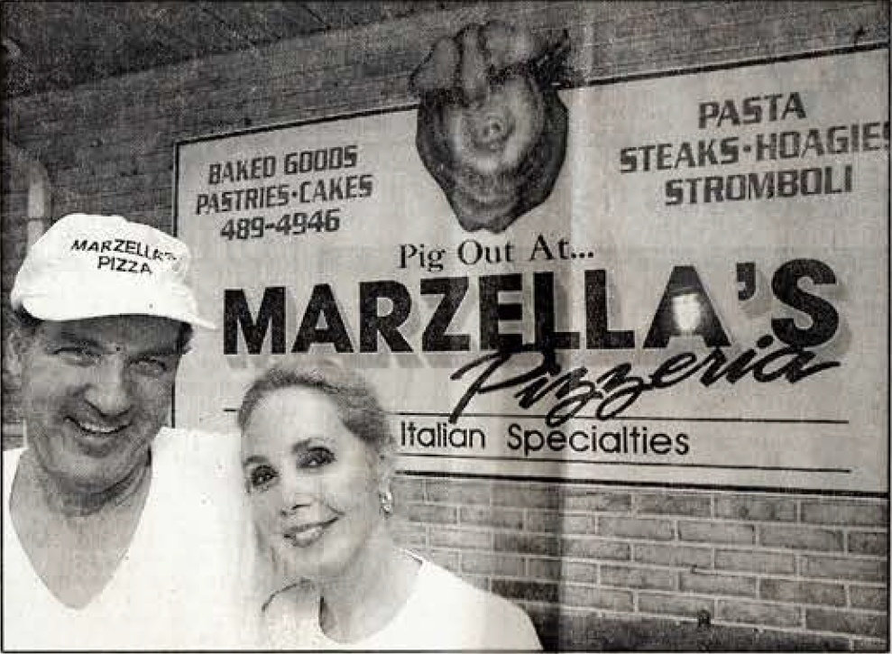 Pig Out at Marzella's Sign